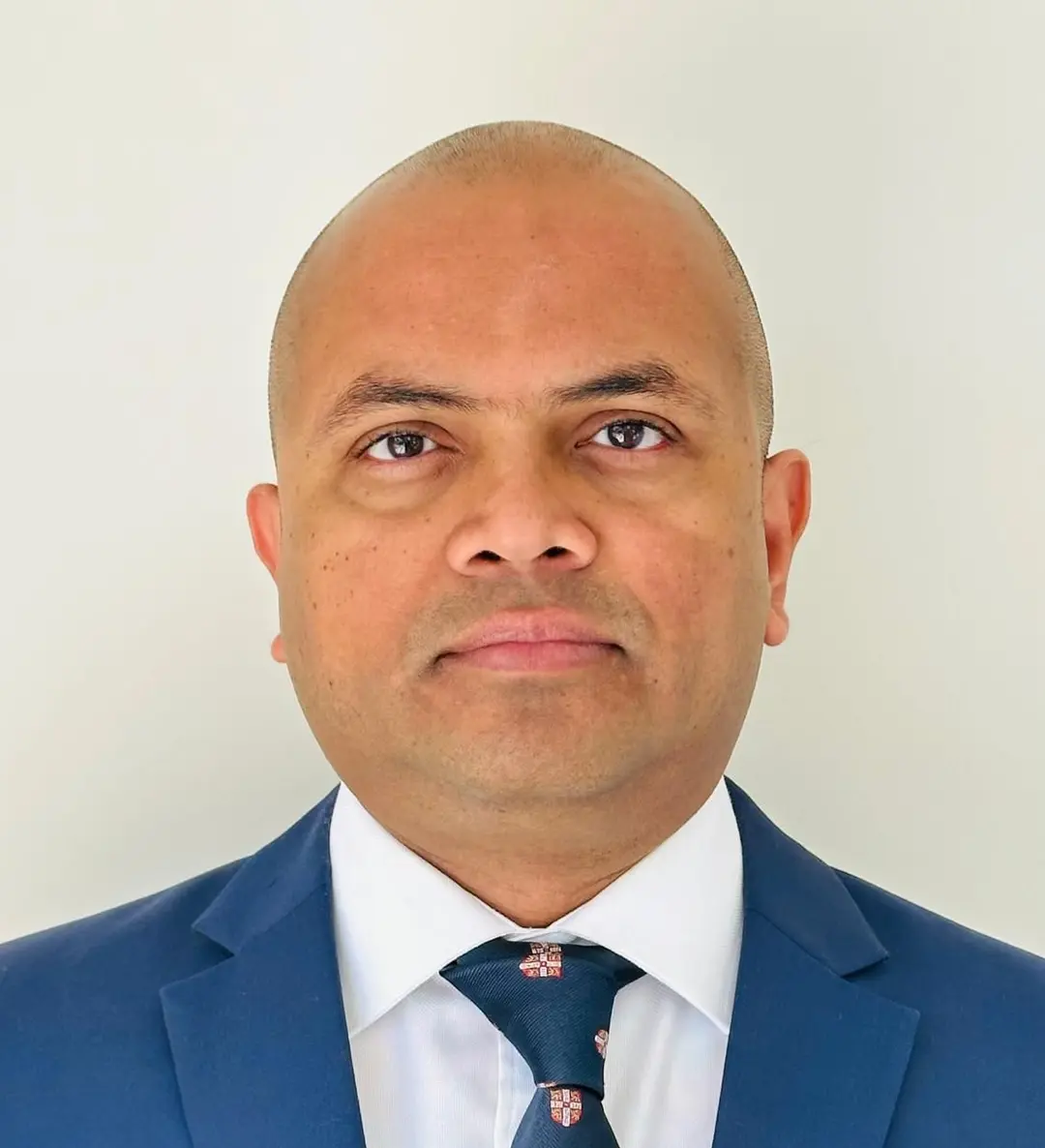 DR. LUNICK ROLLIE SHARDAR