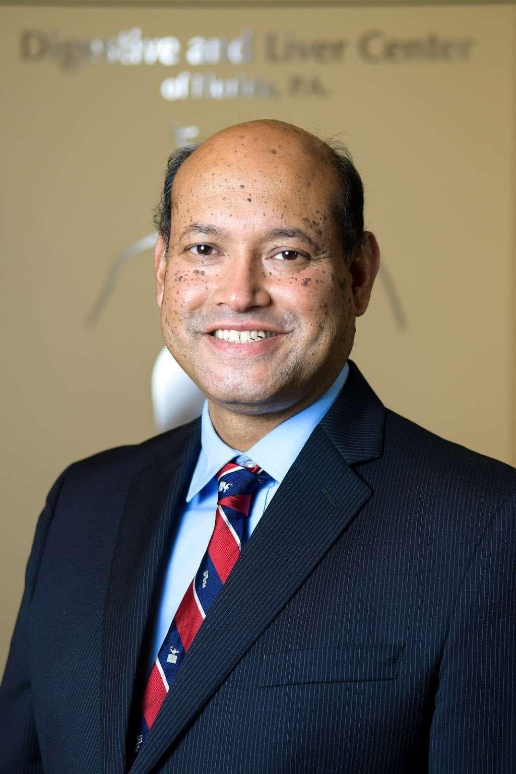 DR. BASHER M. ATIQUZZAMAN